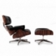 Replica van de Eames fauteuil in kunstleer en chromen onderstel van Charles & Ray