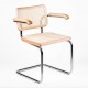 Replica of the Cesca Chair with armrests by designer Marcel Breuer